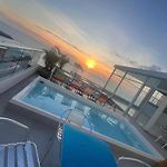 HS-DD Habitación Deluxe cerca al mar con piscina y wifi